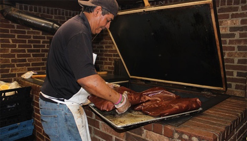 The barbecue hot spot cooks about a thousand briskets a week.