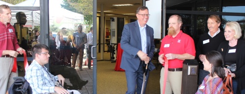 Clients and board members surround Easter Seals Central Texas President and CEO Tod Marvin as he cuts the ribbon on a new fitness center off Dessau Road. 