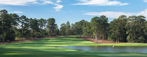The 18-hole Tiger Woods-designed golf course features a number of lakes and rolling hills.