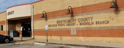 The library was renamed to honor Montgomery County Commissioner Malcolm Purvis in 1997.