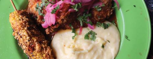 Cholula honey chicken ($12) features a fried chicken breast served with cheesy mashed potatoes and grilled Central Mexican street corn.