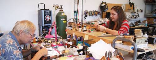 Bob Kardow (left) and Christie Maycock craft custom jewelry at her San Marcos shop.