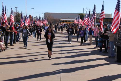 Families go through the Walk of Gratitude  as they enter Strikz Entertainment.