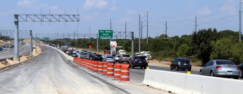 Completion of the MoPac Improvement Project is delayed by a year, but most of the construction north of RM 2222 is complete. The Central Texas Regional Mobility Authority filed a notice of default against contractor CH2M for the delays.