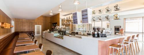 Crave Cupcakesu2019 location in The Woodlands features indoor and outdoor seating.