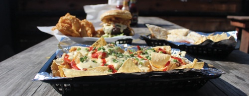 Seafood nachos are one of the most popular items on the menu at Louieu2019s.