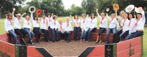 Committee members take a break from planning Fort Bend Caresu2019 2016 Road Trip fundraiser.