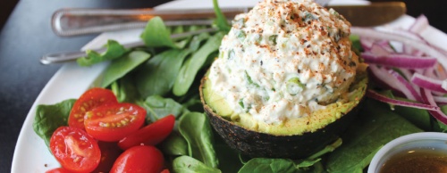 Avocado Bliss features half an avocado stuffed with a choice of chicken or tuna salad ($6.95).