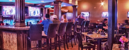Rock &amp; Rolls Sushi Lounge on Padre Island in Corpus Christi features a musical theme as well as seafood appetizers, sushi, desserts and alcoholic drinks.