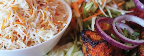 Tandoori chicken ($10.49) is barbecued and served with steamed rice.