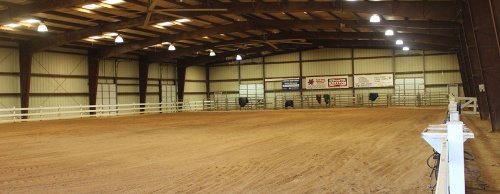 Almond build an indoor riding arena to be able to give lessons year-round.