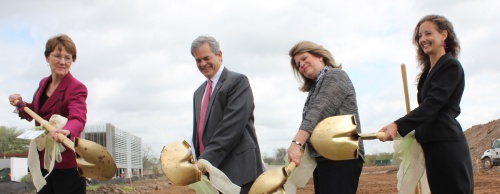 Officials turn dirt at the groundbreaking of Mueller's affordable housing community, Aldrich 51.