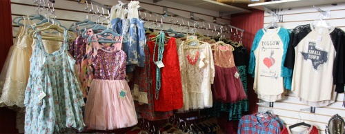The store sells womenu2019s clothing and jewelry as well as clothing for children.