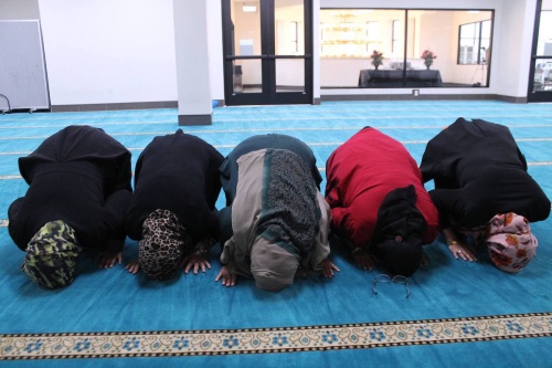 Women pray at the Islamic Center of Frisco in December 2016.