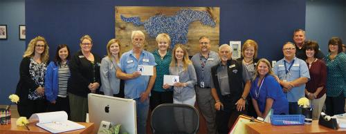 Friendswood ISD Superintendent Trish Hanks (center) announced her retirement in February.