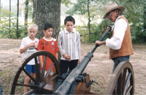 Children watch a pioneer demonstration at the Heritage Museum. (Courtesy Heritage Museum of Montgomery County)