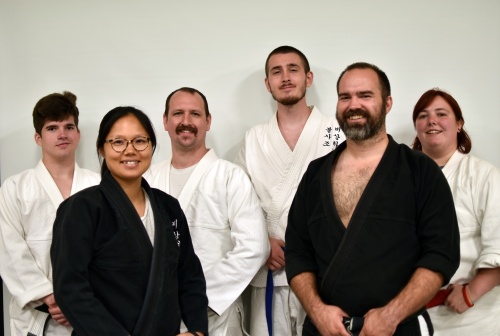 Logan Noren, master Seonok Maeng, Michael McDaniel, Jesse Trader, master John Olds and Christyna Reeves are the instructors at Rising Phoenix Martial Arts in Kyle. (Courtesy Rising Phoenix Martial Arts)