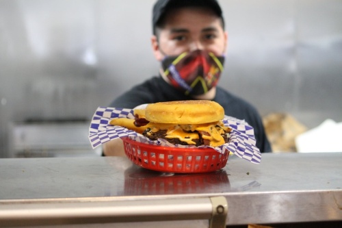 This is the fifth location of the Humble-based eatery, which boasts a menu of hamburgers and chicken sandwiches with toppings ranging from pineapple and sriracha to guacamole and barbecue sauce. (Courtesy Hippo Burgers)