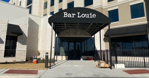 A mid-March opening is expected for the Bar Louie under construction alongside the Embassy Suites by Hilton at 270 Bass Pro Drive, Round Rock, according to a company representative. (Brooke Sjoberg/Community Impact Newspaper)