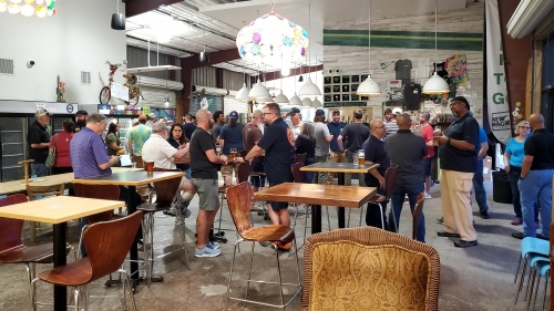 A crowd gathers at New Magnolia Brewing Co. on April 18. (Courtesy Shayn Robinson)