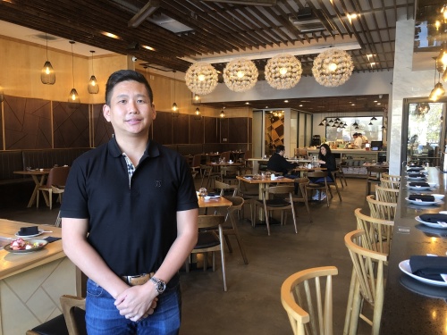 Sherman Yeung took ownership of Tobiuo Sushi & Bar in 2019. Yeung plans to open another restaurant inside Loop 610 serving Japanese cuisine, called Money Cat, later this year. (Photos by Asia Armour/Community Impact Newspaper)