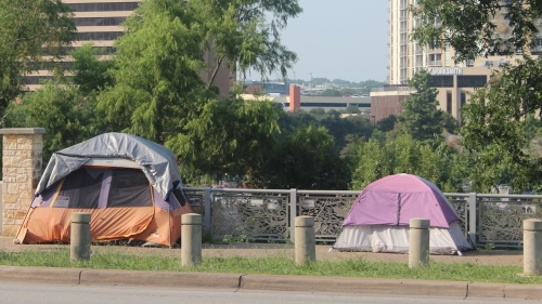 Tents that formerly lined prominent downtown streets have been removed since last year, although encampments are still prevalent elsewhere across town. (Ben Thompson/Community Impact Newspaper)