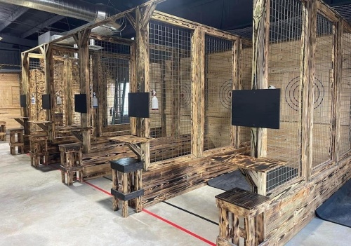Hatchet House Texas has multiple lanes for people to try ax throwing safely and without interference from other patrons. (Courtesy Hatchet House Texas)