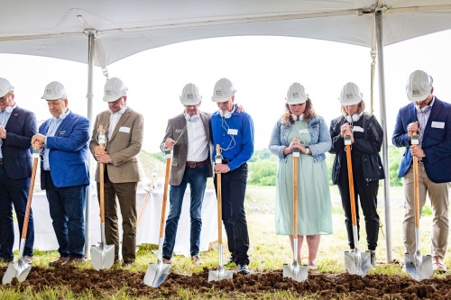 Officials are seen during a ceremonial groundbreaking for Education Media Foundation's new world headquarters in Franklin on May 27. The 170,000-square-foot, six-story office building is slated for completion in 2024. (Courtesy Education Media Foundation)