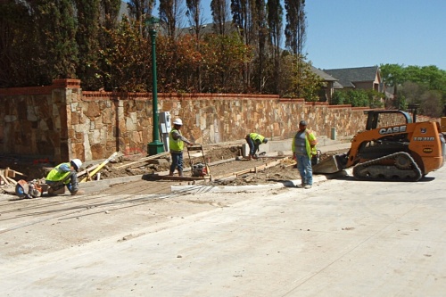 construction workers on Legacy Drive