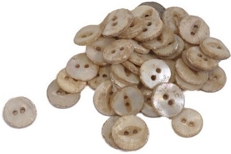 Thousands of porcelain buttons were found by archaeologists during the Austin State Hospital construction process. (Courtesy Texas Health and Human Services Commission)