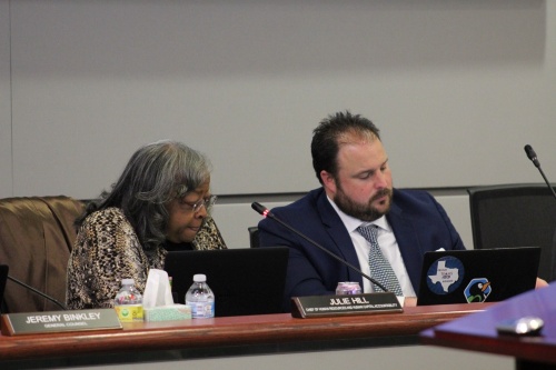 Spring ISD Chief of Innovation Matt Pariseau and Chief of Human Resources Julie Hill attend a school board meeting in April. (Emily Lincke/Community Impact Newspaper)