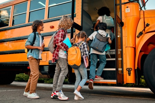 Children near a school bus.