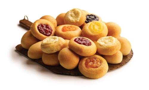 A pile of fruit and cream cheese kolaches