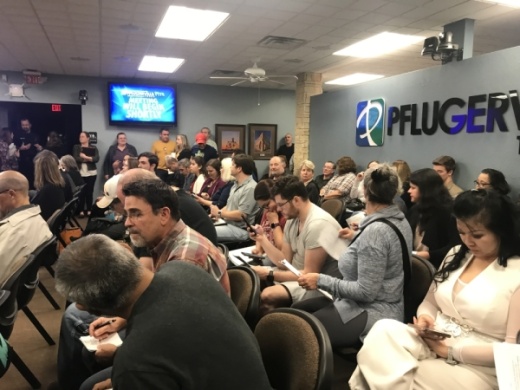 Pflugerville City Hall was standing room only at Pflugerville City Council's Jan. 14 meeting for the first ordinance reading on "Project Charm," a 3.8 million-square-foot distribution center. (Kelsey Thompson/Community Impact Newspaper)