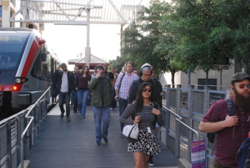Commuters arrive at downtown Austin's lone light rail stop. (Christopher Neely/Community Impact Newspaper)