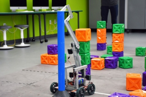 This robot operated by a student navigates objects in The STEM Center. (Makenzie Plusnick/Community Impact Newspaper) 
