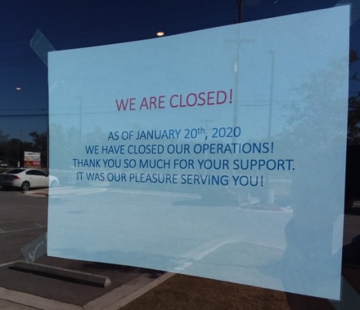 This sign was on the front door of Russo's on Jan. 23. (Brian Perdue/Community Impact Newspaper)