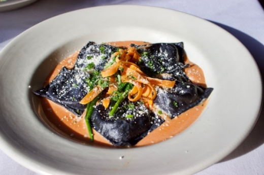 Black linguine stuffed ravioli is served with a house-made pink sauce. (Taylor Jackson Buchanan/Community Impact Newspaper)