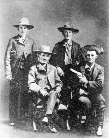 Sam Bass (back row, far left) formed a band of outlaws who robbed trains, stagecoaches and banks in the late 1800's.