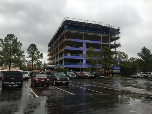 An office building is under construction at Lakeside Boulevard and Technology Forest Boulevard. (Vanessa Holt/Community Impact Newspaper)