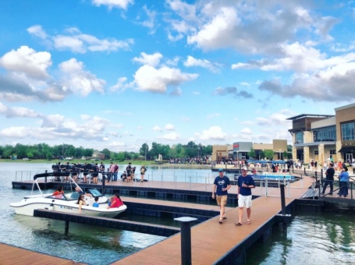 




Residents gather at the Boardwalk at Towne Lake, a mixed-use development in Cypress. (Courtesy Caldwell Companies)
