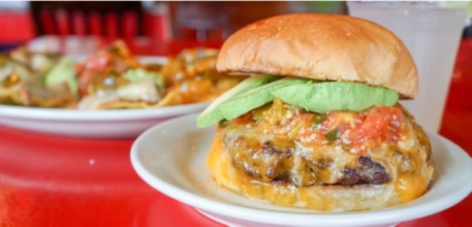 The El Ray Burger is one of the cantina’s most popular menu items (Photo by Lauren Canterberry/Community Impact Newspaper).