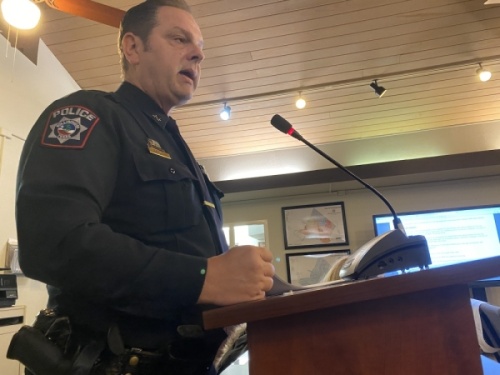Rollingwood Police Chief Jason Brady presents his report on officer retention to City Council on Feb. 19. (Brian Rash/Community Impact Newspaper)