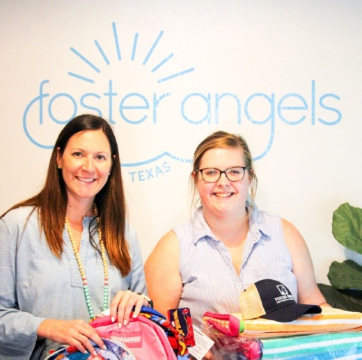 Tania Leskovar-Owens (left) and Maggie Sheppard pose with some of the items they will give to foster children in Central Texas. (Brian Rash/Community Impact Newspaper) 