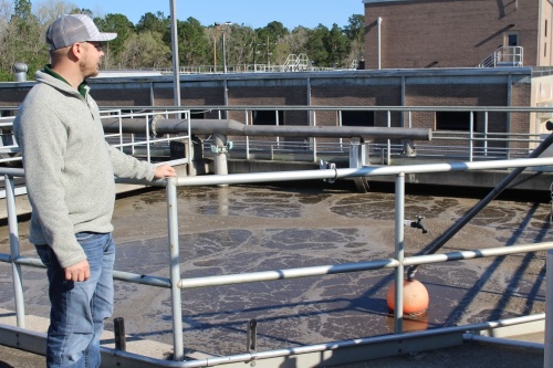 Greg Hall, superintendent of Conroe's wastewater treatment plant, says the new plant will ease some of the burden from the existing plant, which is pictured. (Eva Vigh/Community Impact Newspaper)
