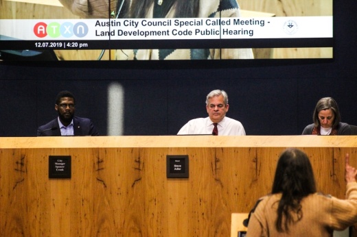 Austin Mayor Steve Adler (center), flanked by Assistant City Manager Christopher Shorter and City Attorney Ann Morgan, listen to public testimony on the land development code rewrite Dec. 7. (Christopher Neely/Community Impact Newspaper)