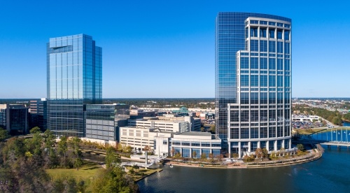 Western Midstream Partners LP will occupy the top five floors of the tower at 9950 Woodloch Forest Drive. (Courtesy The Howard Hughes Corp.)