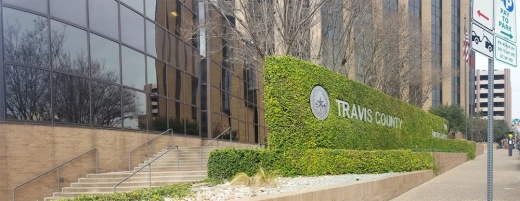 A photo of the exterior of the Travis County government headquarters