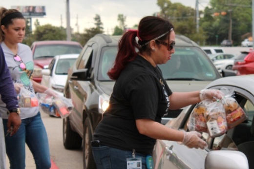 Conroe ISD volunteers have distributed about 80,000 meals, according to Superintendent Curtis Null. (Andy Li/Community Impact Newspaper)