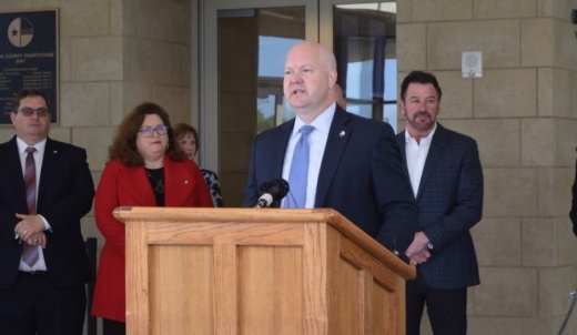 Collin County Judge Chris Hill announced a stay-at-home order March 24 to limit the spread of the coronavirus. It was followed by a more restrictive order by McKinney Mayor George Fuller, far right, who also attended the March 24 news conference. (Emily Davis/Community Impact Newspaper)
